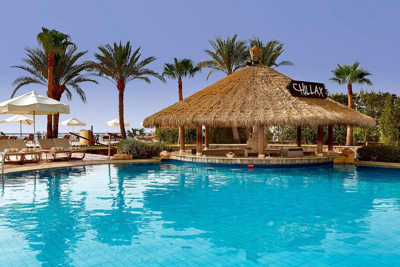 Safir Sharm Waterfalls Resort Buitenkant foto The pool at the Hilton Sharm El Sheikh
